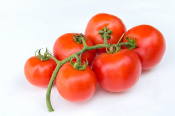 Close up red cherry tomato on white background isolated.
