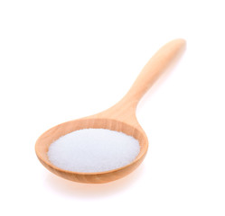 Salt in wooden spoon on white background