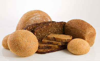 Various bread over a white background.