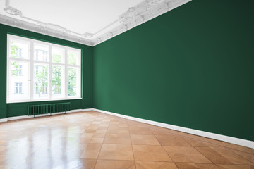 empty room, wooden floor in new apartment, stucco ceilings and green walls