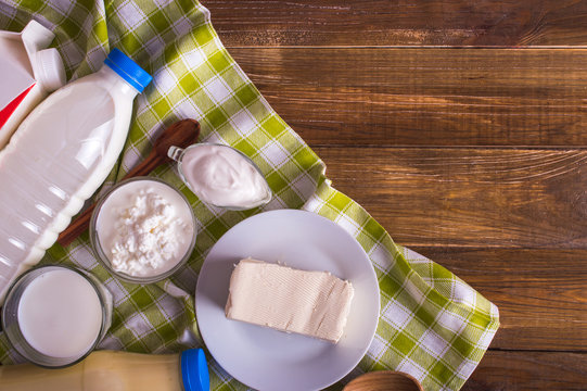 Dairy products on a wooden background. Top view