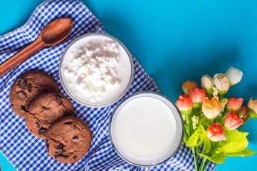Milk and cookies, cottage cheese and butter. Breakfast concept