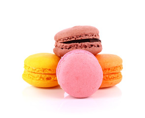French colorful macarons isolated on white