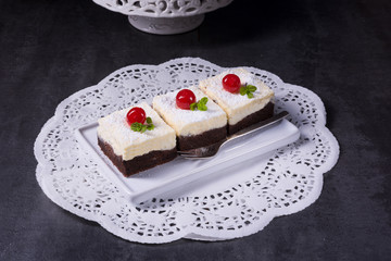 chocolate cream cake with cherries