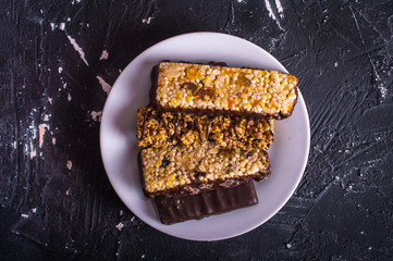 A bar of cereals on a wooden background
