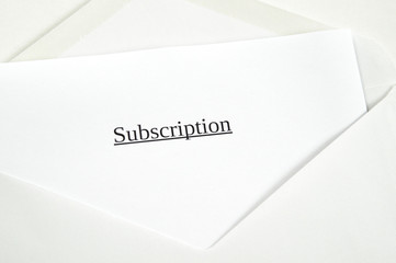 Subscription printed on white paper and envelope, white background