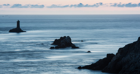 Fototapeta premium Lighthouse on Cape Sizun, Pointe du Raz. Brittany, France