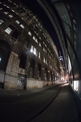 New York City's World Trade Center at night. Shot with a fisheye lens in a back alley during a Spring 2017 night.