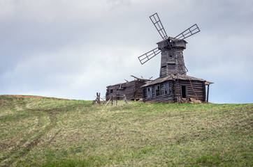 Old wooden windmill / The picture was taken in Russia, the Orenburg region, the village of Saraktash, Krasnaya Gora