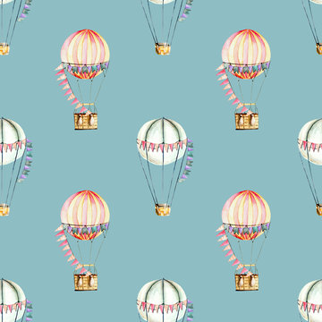 Seamless pattern with watercolor festive air balloons (aerostats), hand drawn isolated on a blue background