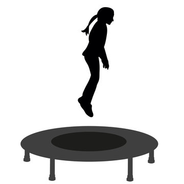 silhouette of a little girl jumping on a trampoline