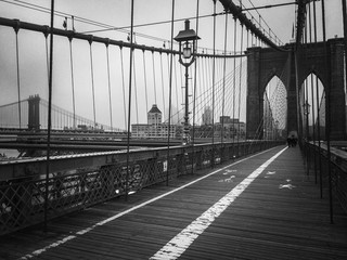 Brooklyn bridge walkway in black and white