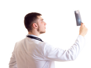 Young man in doctor gown