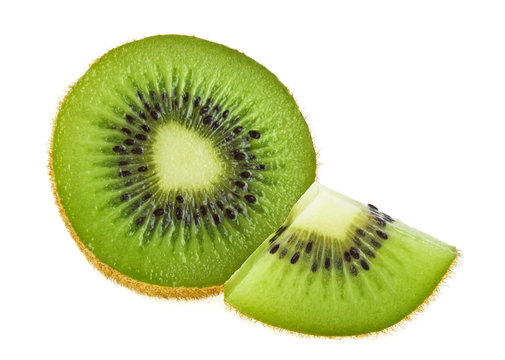 Ripe kiwi fruit slices isolated on a white background
