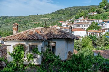 Old house and view on Siringe village, Izmir, Turkey