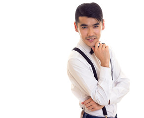 Young man with bow-tie and suspenders