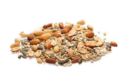 Healthy mix of salty and spicy peanuts, almonds, sunflowers, and pumpkin seeds, isolated on white background