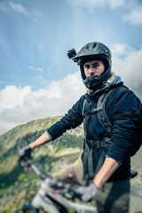 Mountainbiker With Actioncam On Helmet