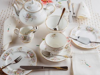  Home celebrations can enjoy a festive table for tea with beautiful tea pots, cups,   saucers,...