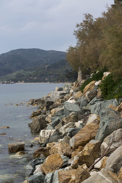 View of rocky coast line, with sea and sky, photographed in Greece, spring day