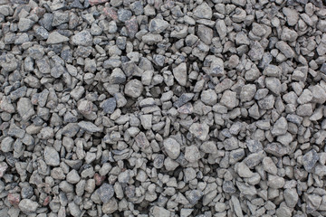 Cement stones close-up. Cement stones of various shapes photographed close-up on a construction site.