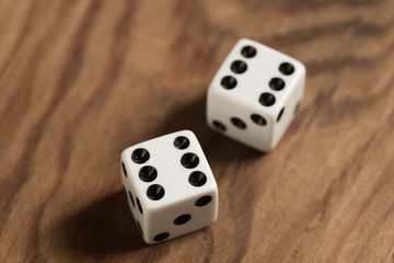 wite dices with number 6