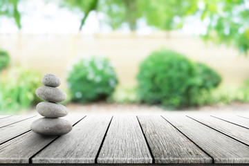 zen stones on wooden in Japanese garden spring Season. Concept relaxation,zen,spring.