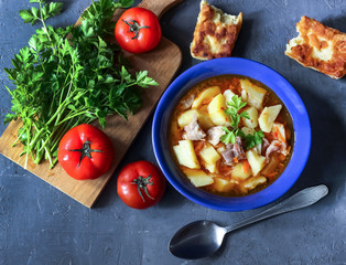 Thick potato soup with meat