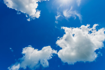 Bright sun in blue sky.