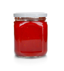 Jar with delicious tomato sauce on white background