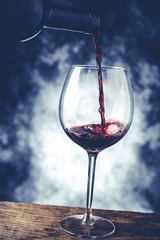  red wine glass and bottle -  fine wine tasting  concept