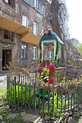 statue of Mary in a backyard in the Praga district