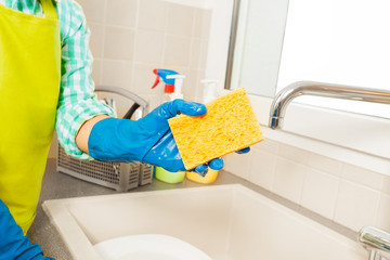 Close-up picture of kid's hand holding sponge
