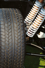 Racing tyres and suspension