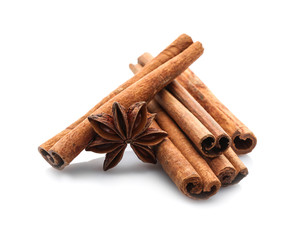 Cinnamon sticks and anise star isolated on white
