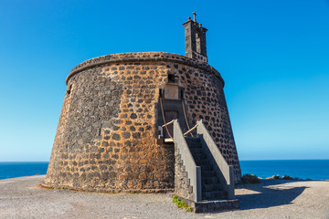 Castle Castillo de las Coloradas on cliff in Playa Blanca, Lanzarote, Canary Islands, Spain