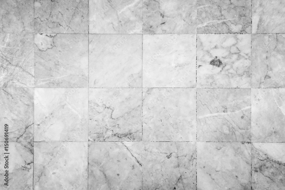 Poster close-up of a smooth marble floor with vignetting viewed from above in black&white.