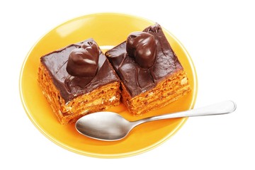Chocolate cakes on orange plate