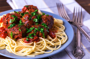 Traditional Italian spaghetti pasta with beef meatballs