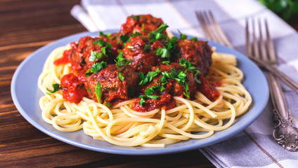 Traditional Italian spaghetti pasta with beef meatballs