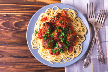Traditional Italian spaghetti pasta with beef meatballs