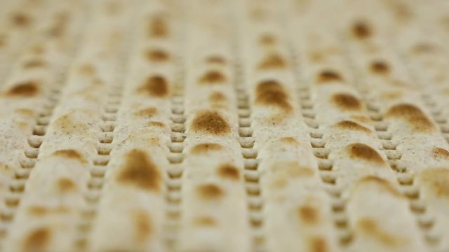 Passover or Pesach matzah is a traditional jewish holiday bread for passover. Pesach celebration symbol.