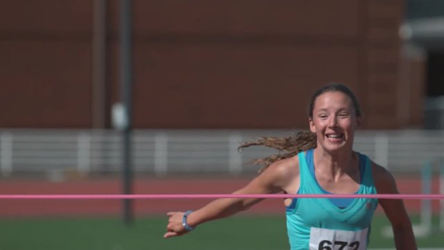 Track crosses finish line in super slow motion, shot on Phantom Flex 