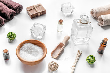 bathroom salt and aroma oil for spa on white background