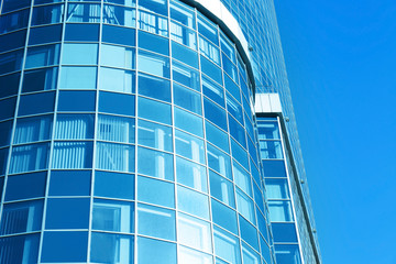 Obraz premium Modern office building with tinted windows, exterior view