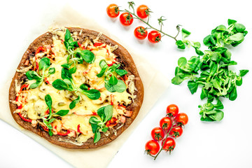 restaurant kitchen with pizza preparing on white background top view