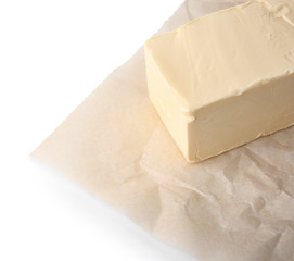 Delicious butter piece on white background, closeup