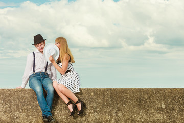 Fototapeta premium Loving couple retro style dating on sea coast