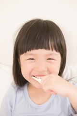 cute girl brush teeth
