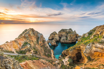 Beautiful sunrise over Ponta da Piedade,Algarve,Portugal - obrazy, fototapety, plakaty